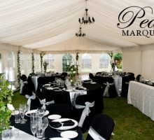 Black chairs and White Sashes