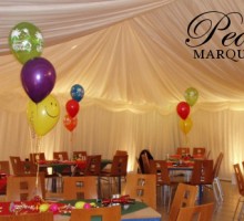 Uplighters give ambience to a party marquee